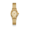 Reloj ovalado dorado elegante